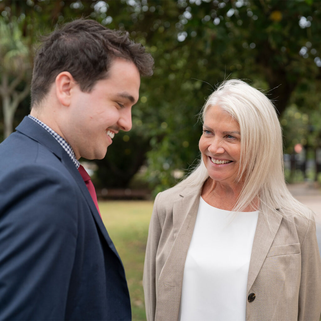 man and woman having conversation