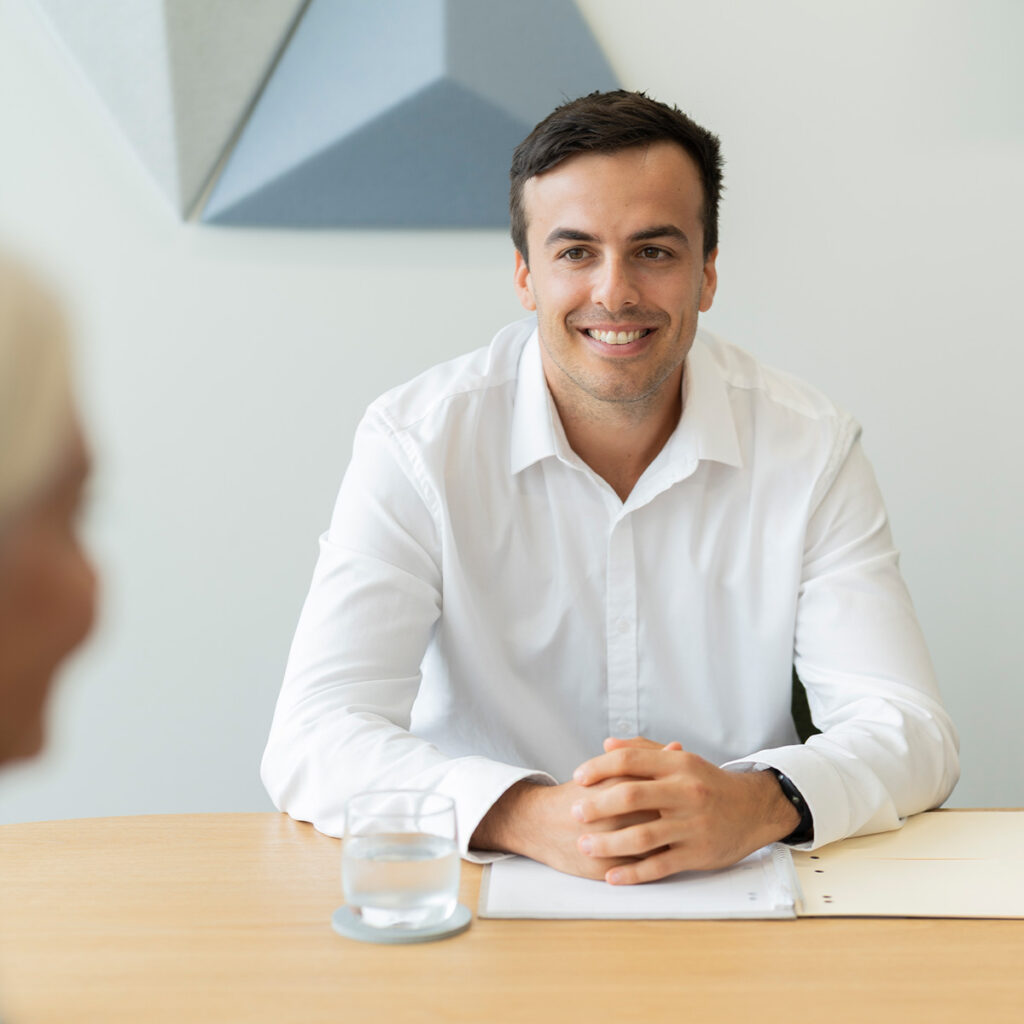 man smiling at client