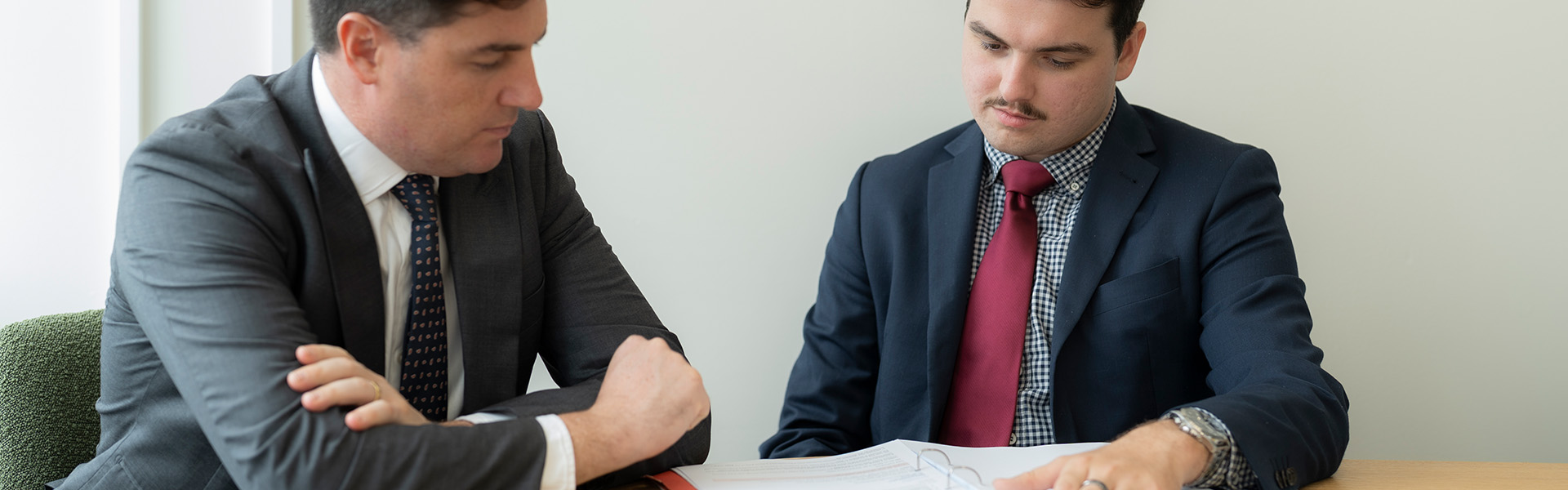 two professionals talking